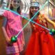 Zoë and Kaylee with light up swords at Medieval Times in Buena Park, CA