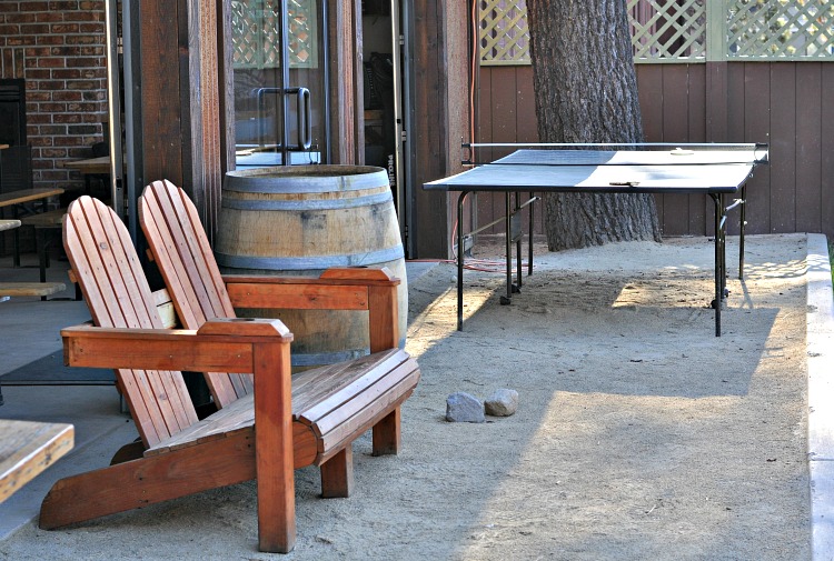 Ping pong table and lounge chairs at Basecamp Hotel in Tahoe South