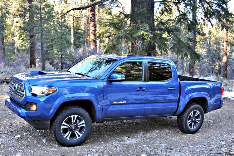 Side view of blue Toyota Tacoma that I took off roading