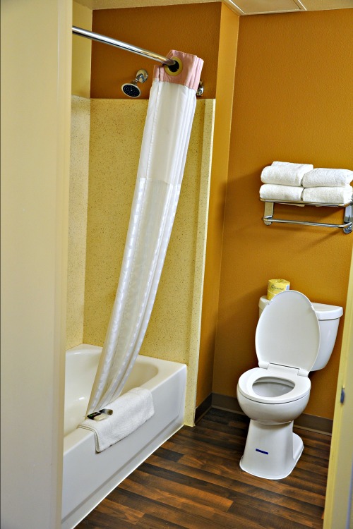 Shower and toilet in Extended Stay America hotel room