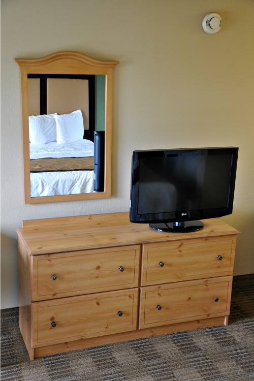 Dresser and TV in Extended Stay America hotel room