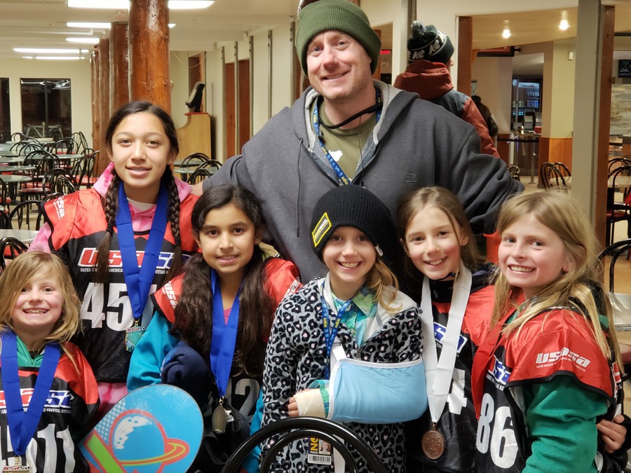 Brian with the girls he coached at USASA Rail Jam
