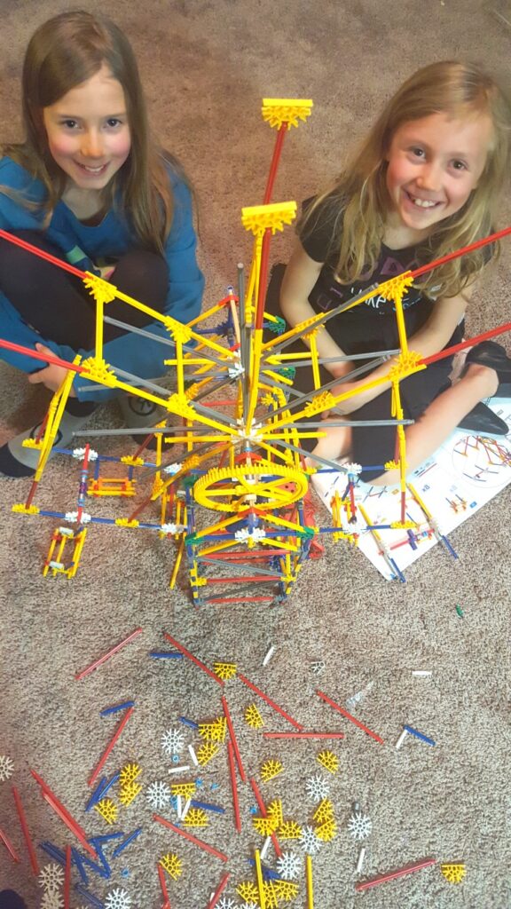 Zoë and Kaylee building a Ferris Wheel