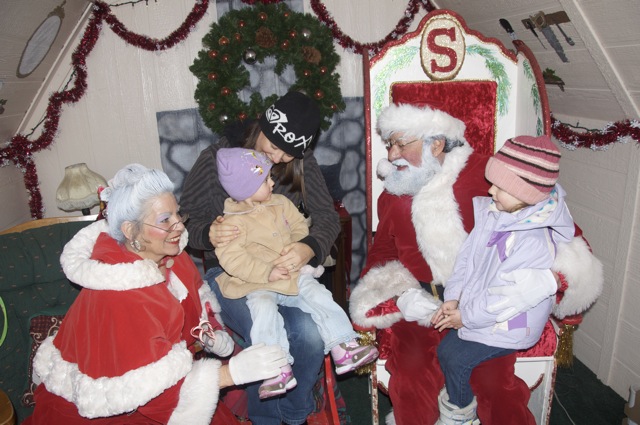 Chrystal, Zoë and Kaylee with Santa and Mrs. Claus
