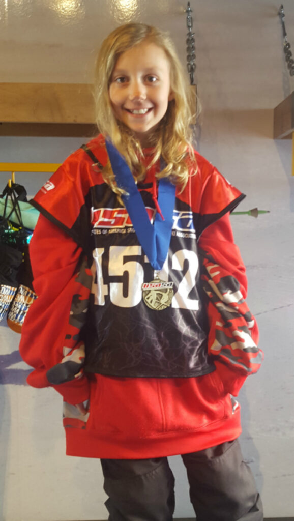 Kaylee with her snowboarding medal