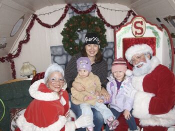 Chrystal with the girls, Santa and Mrs. Claus
