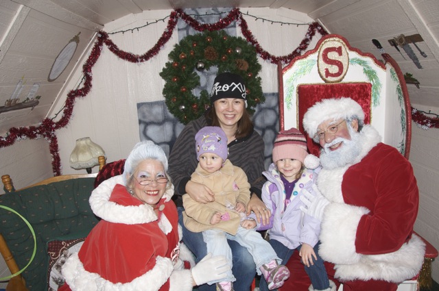 Chrystal with the girls, Santa and Mrs. Claus