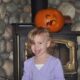 Zoë Showing Off the Pumpkin She Helped Daddy Carve