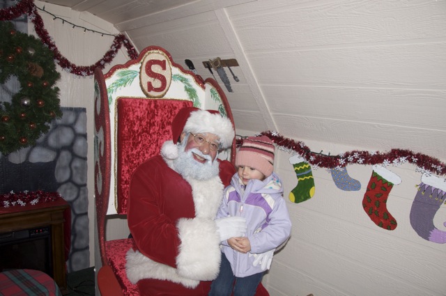 Zoë sitting on Santa's lap