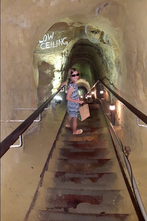Zoë walking down the stairs to the La Jolla Cave