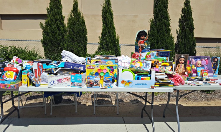 A table of toys to donate to Rady Children's Hospital