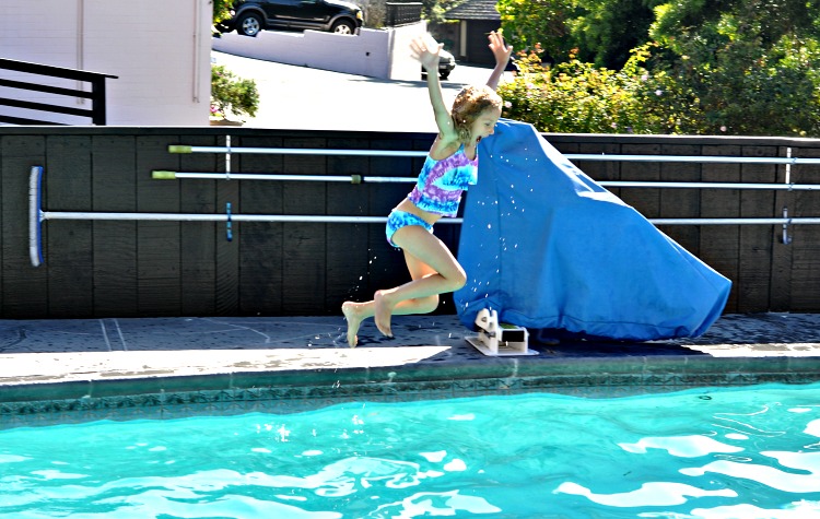 Kaylee jumping into the pool at Hofsas House