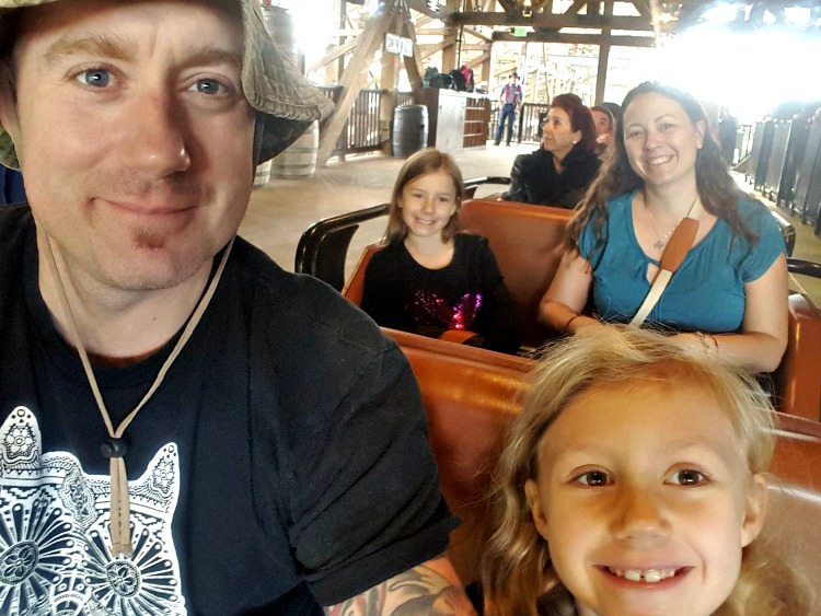 Our family on the Ghostrider Roller Coaster at Knott's Berry Farm