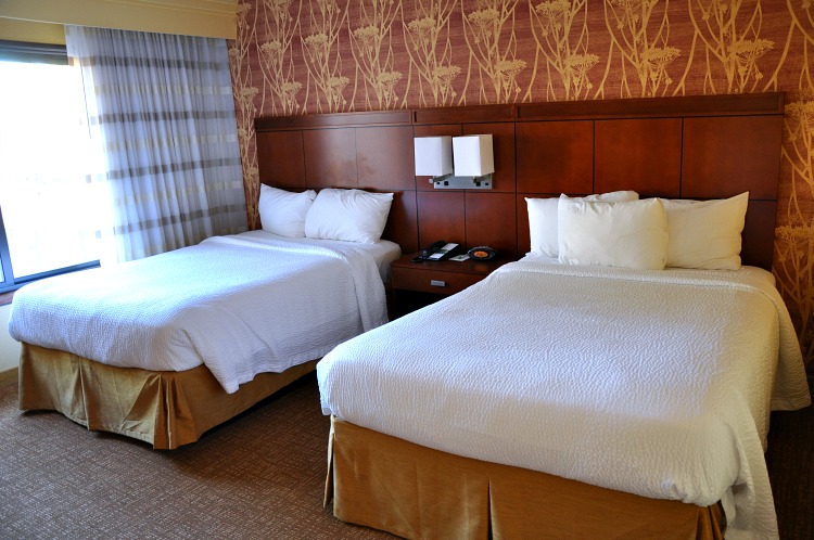 Two beds in the bedroom at our Courtyard Marriott suite