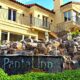 Pantai Inn entrance with waterfall
