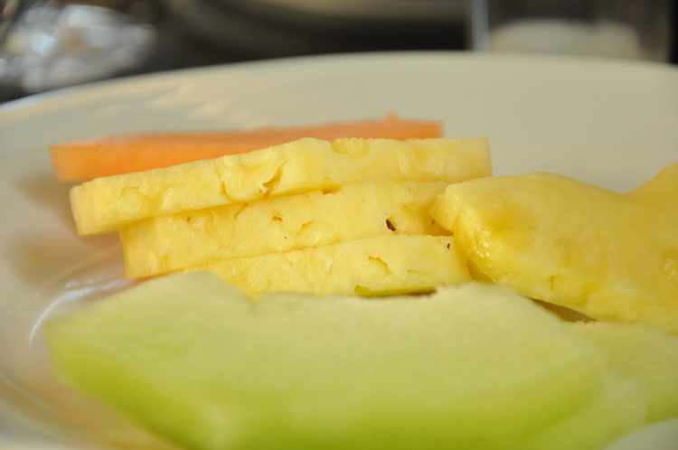 Pineapple and melon on a plate