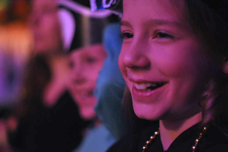 Zoë smiling at the Pirate's Dinner Adventure show in Buena Park, CA