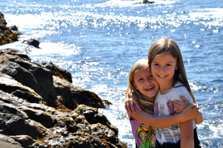 Zoë and Kaylee hugging at Point Lobos State Reserve in Northern California