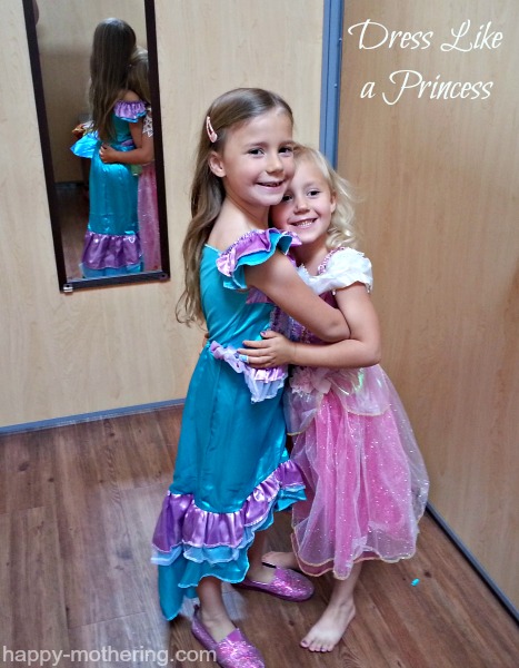 Zoë and Kaylee trying on princess costumes