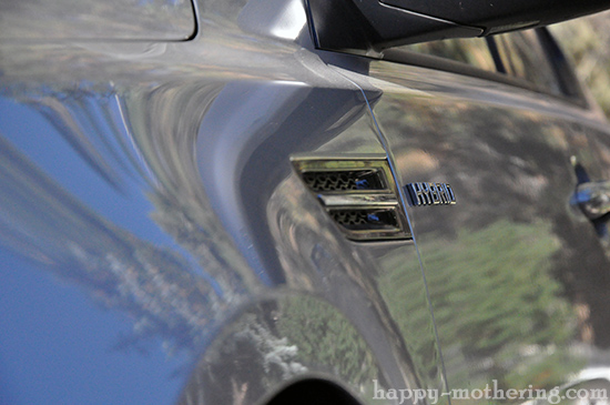 Side panel of gray Kia Optima Hybrid