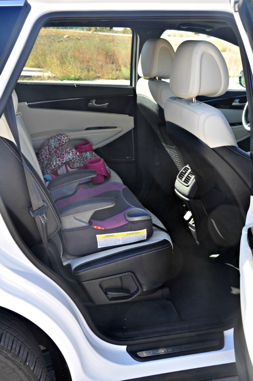 Back seat of the Kia Sorento with two booster seats installed