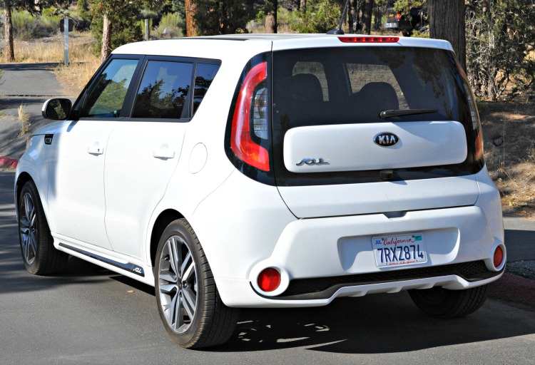 Rear angle view of white Kia Soul