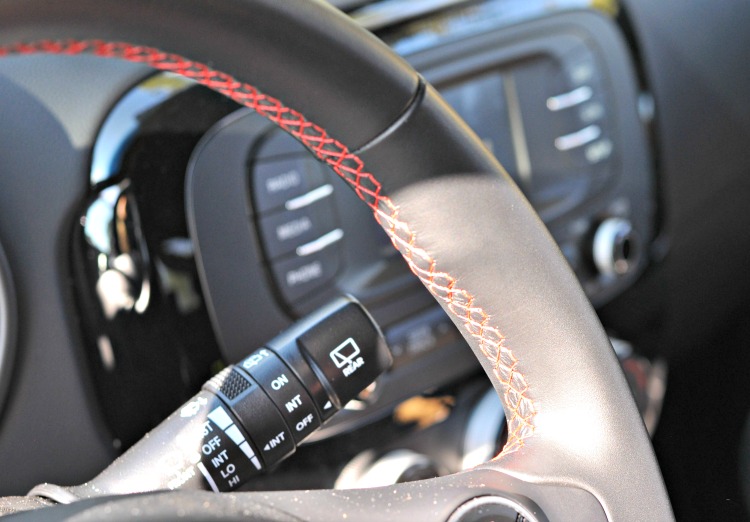 Red stitching on steering wheel in Kia Soul
