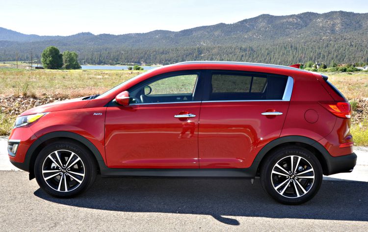 Side view of red Kia Sportage