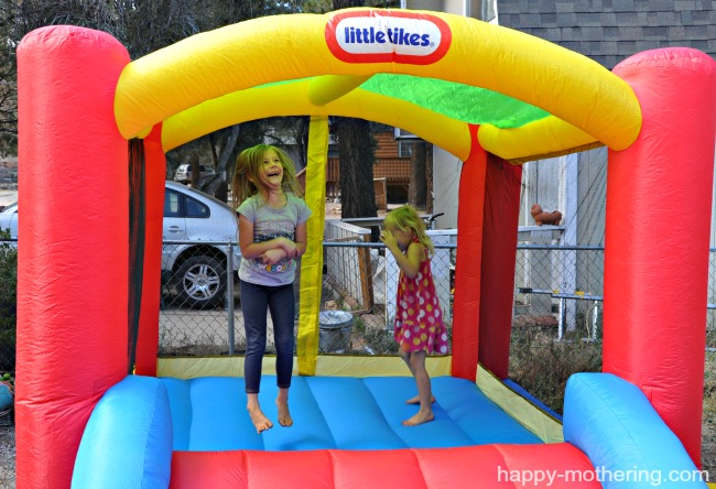 Zoë and Kaylee jumping in their bouncy house for the first time