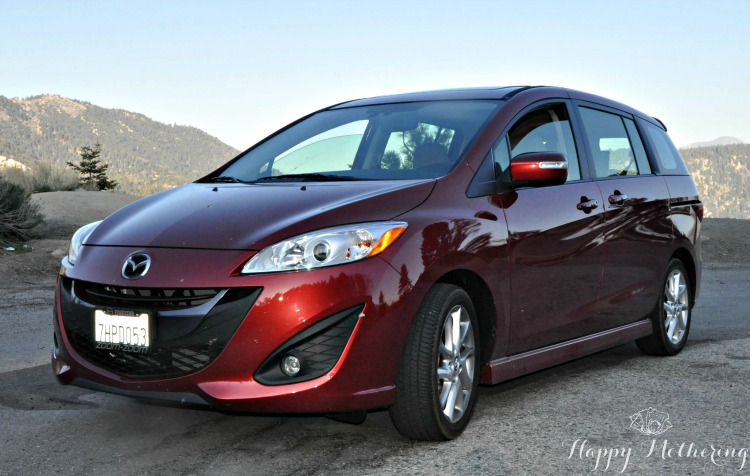 Front of the Mazda5 on a mountain road