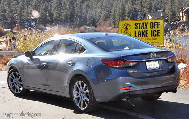 Mazda6 Grand Touring by stay off lake ice sign