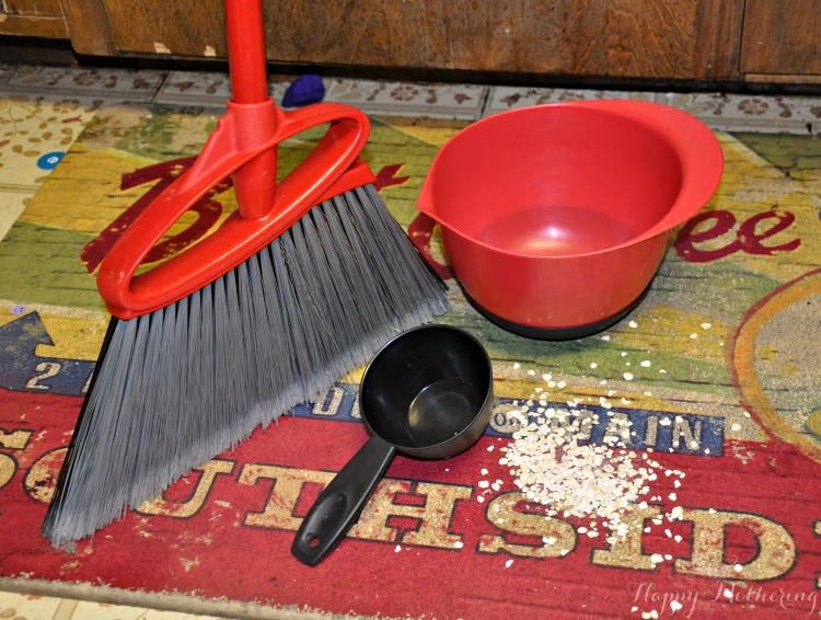 Broom to sweep up mess on floor from baking