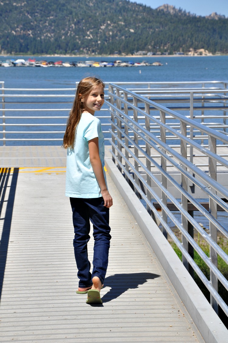 Zoë walking down the bridge by Big Bear Lake