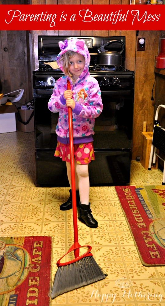 Kaylee sweeping up the kitchen floor