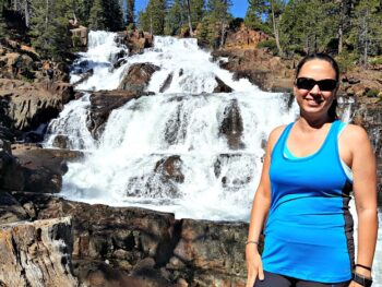 Chrystal standing in front of a waterfall in Tahoe South