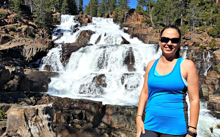 Chrystal standing in front of a waterfall in Tahoe South