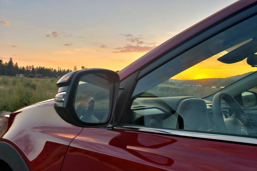 Toyota RAV4 mirror with sunset in the background